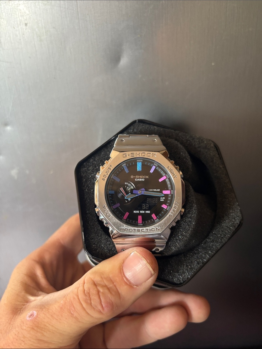 G-Shock Silver Watch with Black Dial and Pink & Blue Accents